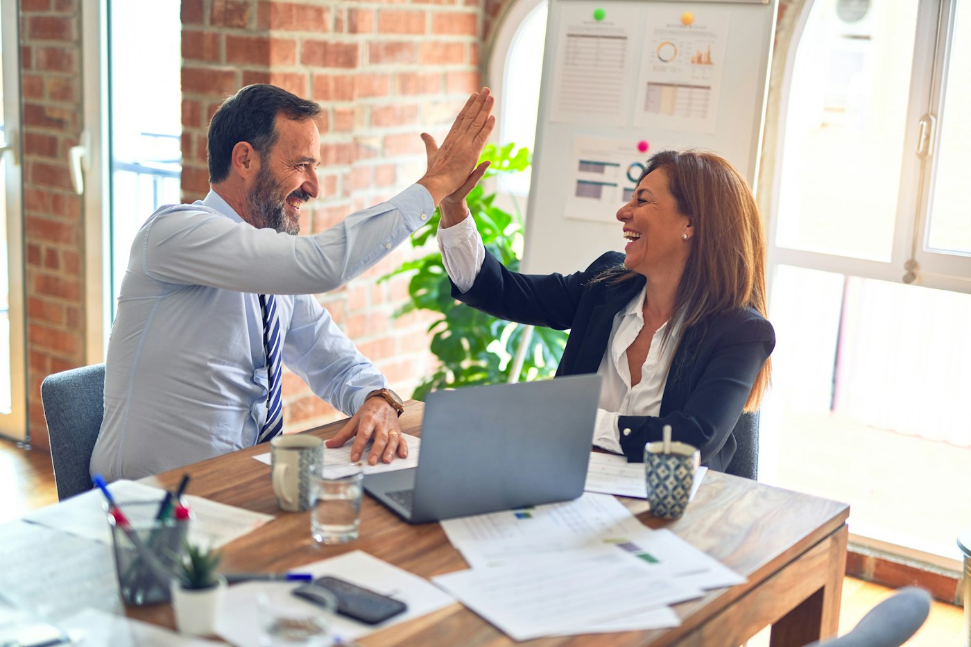 Syntaxel consultants collaborating with a client